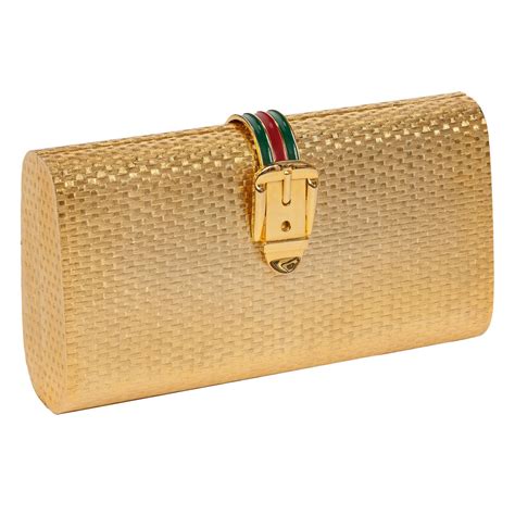 gold clutch gucci|Gucci gold clutch bag.